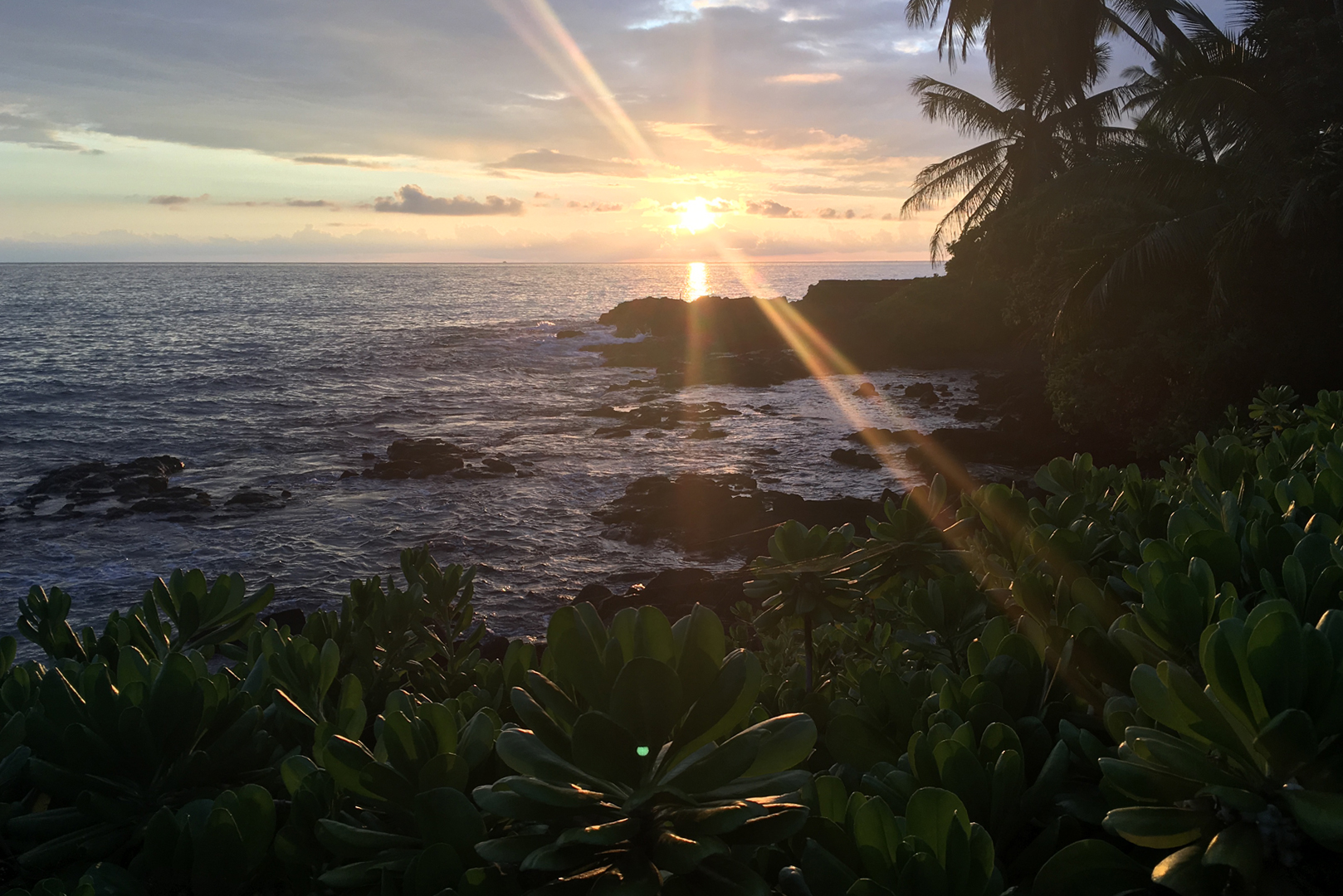 A view of a Holualoa bay sunset taken from in front of the house