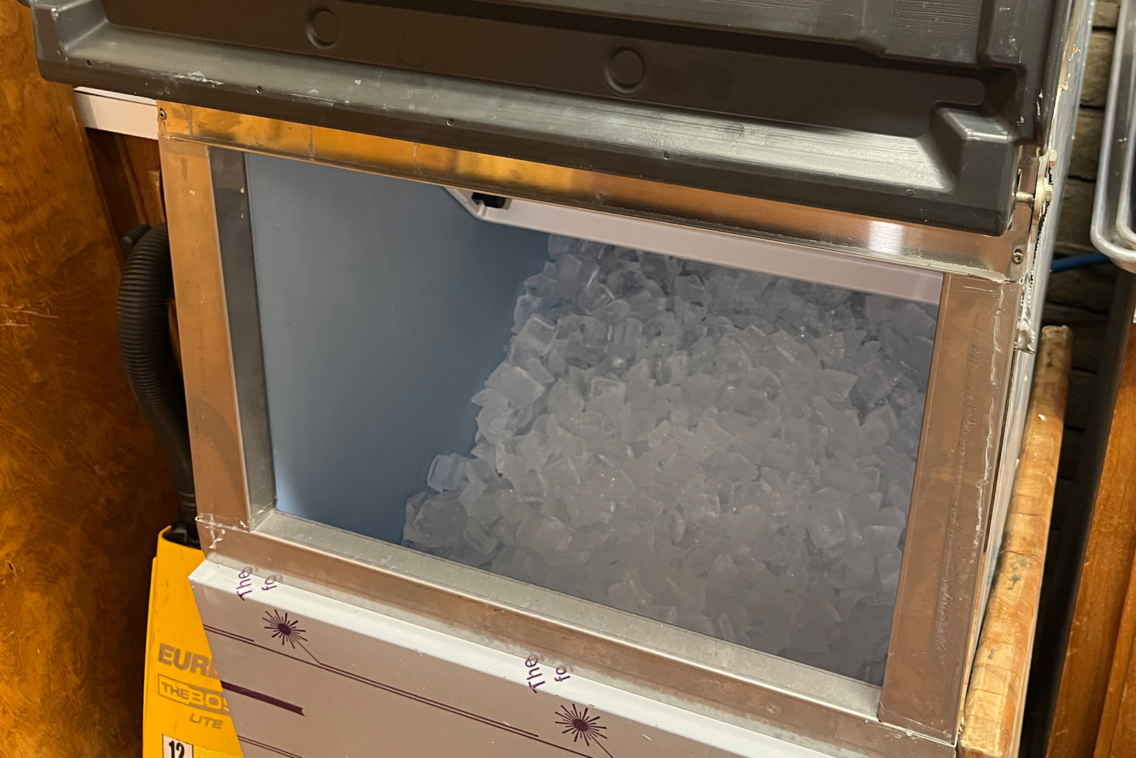 A view of the ice machine located in the laundry area